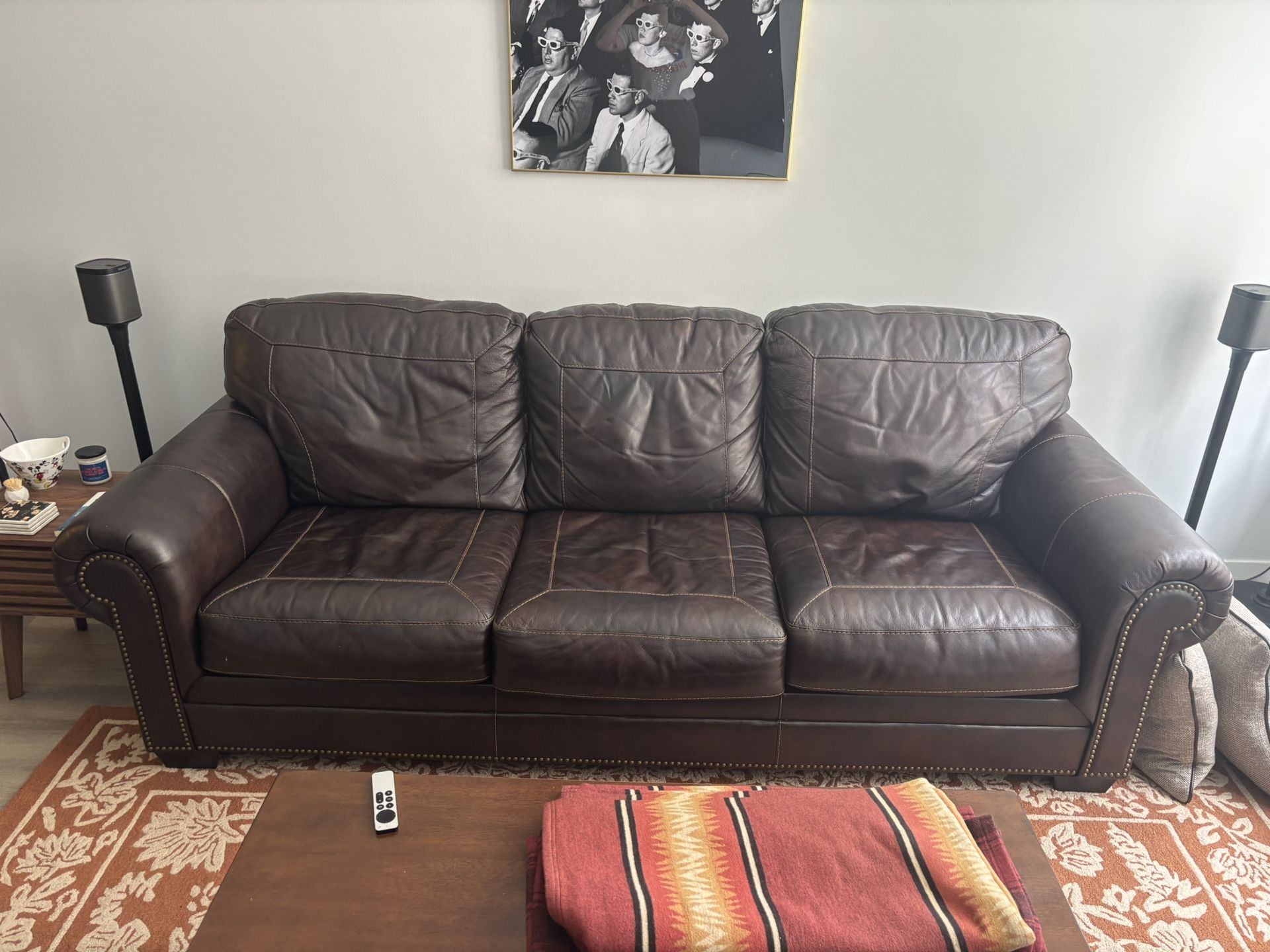 Ashley Furniture Roleson 3 seat leather sofa, dark brown