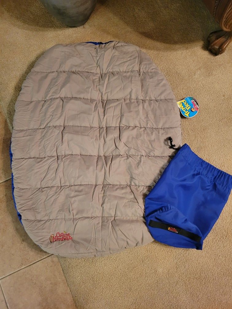 Travel Dog Bed. NEW. 30 X 39". Soft and Puffy. Rolls Up Nicely With Carry Bag.