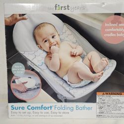 The First Years Sure Comfort Folding Baby Bather - Baby to Toddler Bath Tub