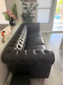 Black leather sofa & brown leather couch