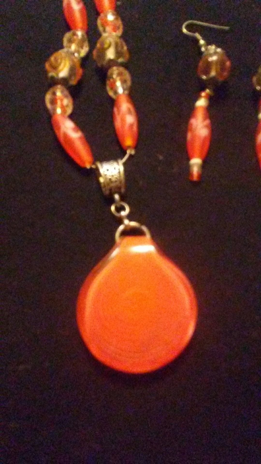 Handcrafted orange glass necklace and earring set