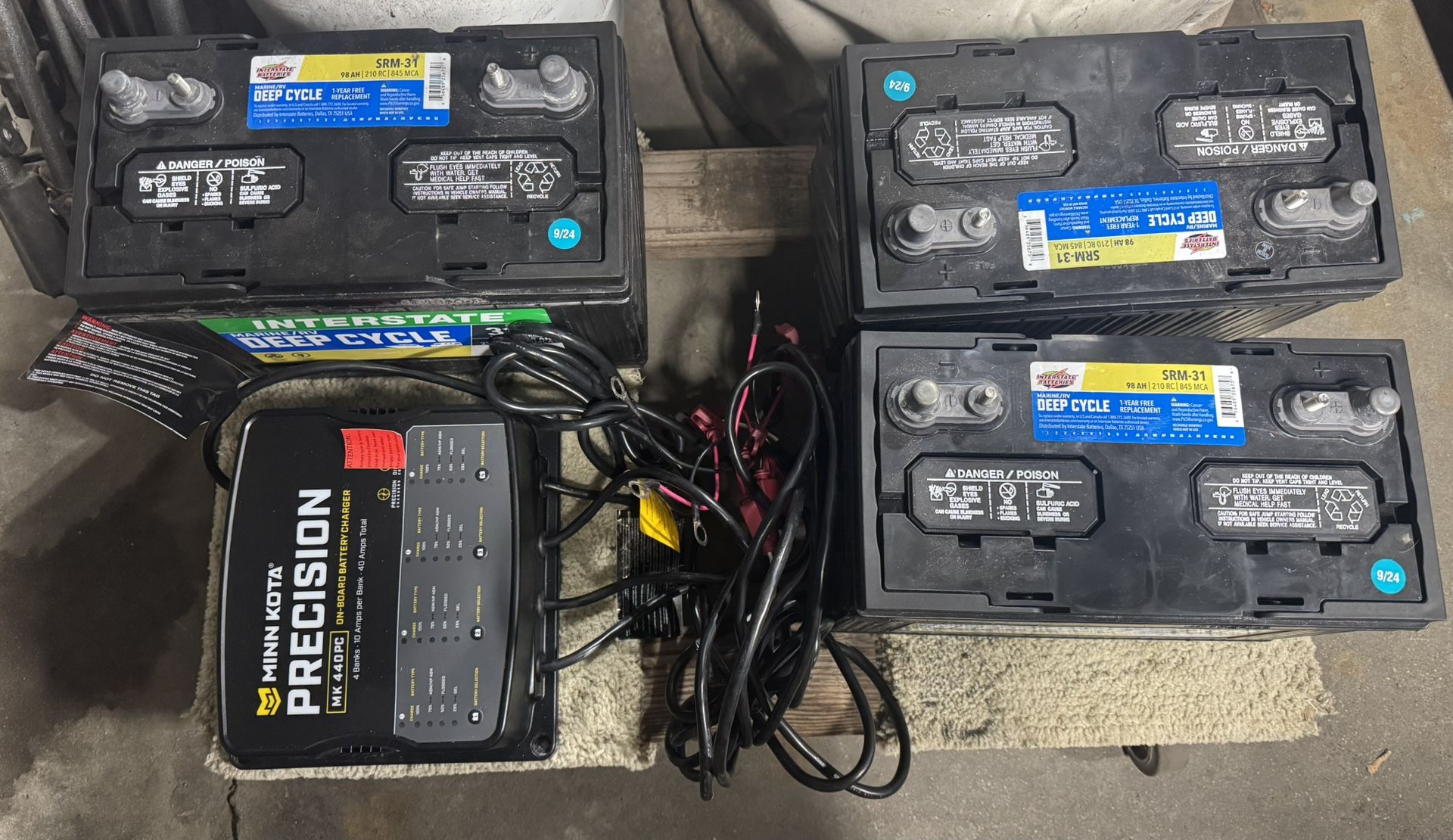 3 Interstate Marine Deep Cycle SRM-31 Batteries And MinnKota Precision MK 440 PC 4bank Charger (bundle)
