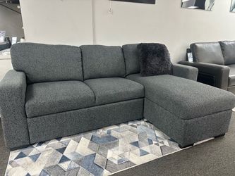 Beautiful Grey Pull Out Sleeper Sectional Available $799