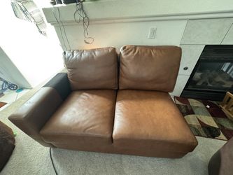 Leather Love Seat For ($20)