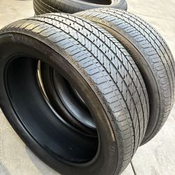 275/50r22 Two Bridgestone Tires In Good Shape