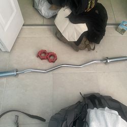 Olympic curl bar with clamps