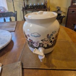 Porcelain beverage dispenser with cow designs
