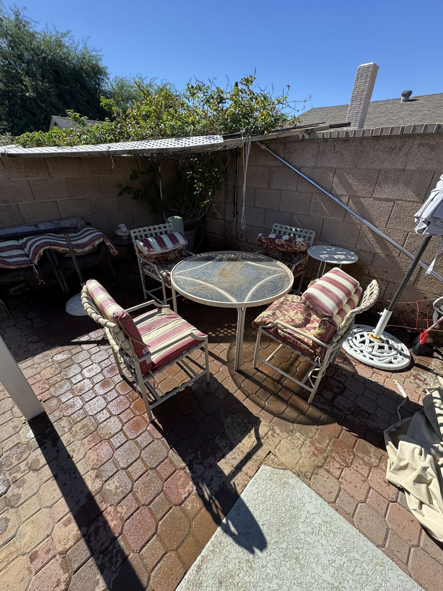 Patio Furniture Round Table With Four Chairs And The Cover