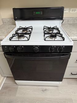 GE XL44 gas stove oven