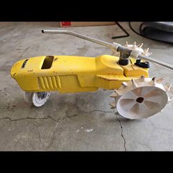 Metal Sprinkler Tractor For The Garden 