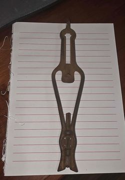 Old cast iron tin can opener