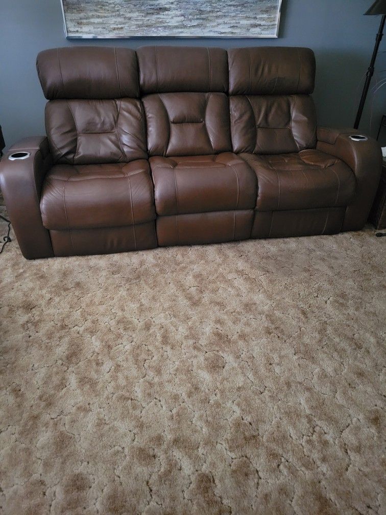 BROWN LEATHER RECLINING SOFA
