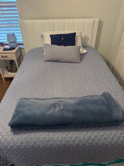 Full size bed with mattress and boxspring