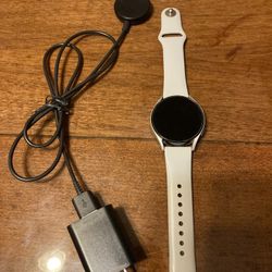 Samsung galaxy watch 4.(grey) with charger. Works great. 