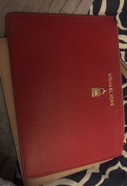 Red a Michael Kors wristlet