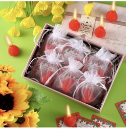 Baby shower strawberry candle favors with notice
