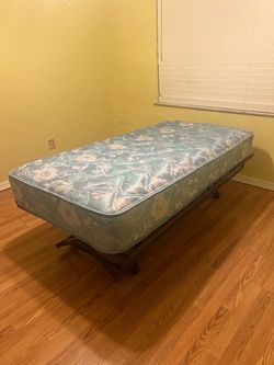 Twin bed almost new plus two dressers and lamps