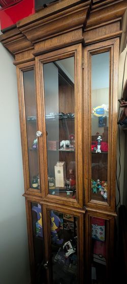 We're moving and can't take this loved little curio cabinet.
