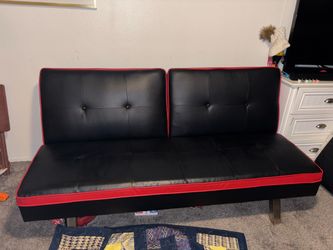 Red Futon with bluetooth Speakers