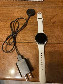 Samsung galaxy watch 4.(grey) with charger. Works great. 
