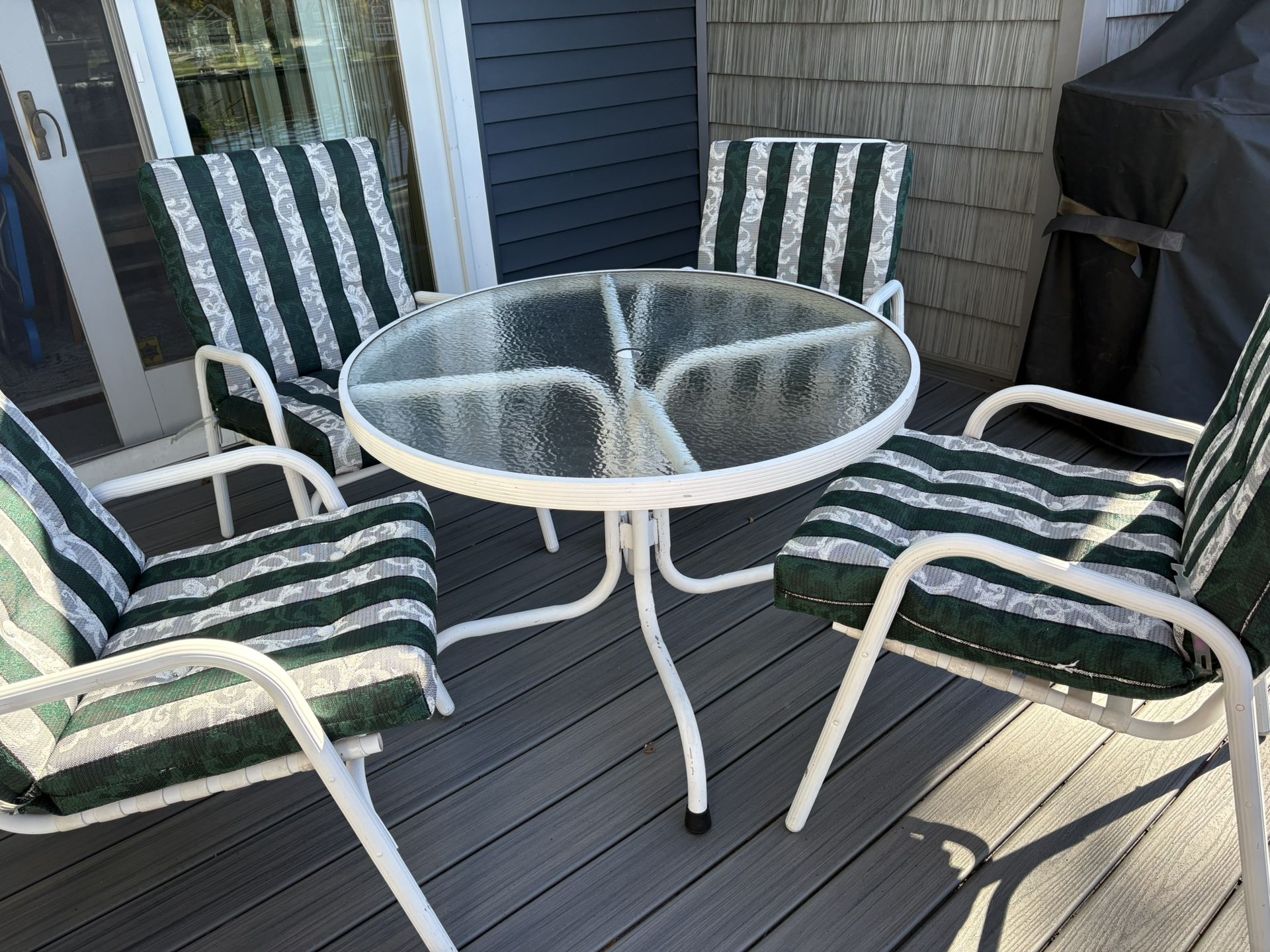 Glass Patio Table And 4 Chairs With Cushions