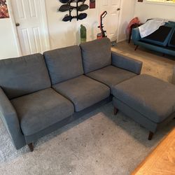 Grey Fabric couch with matching ottoman 