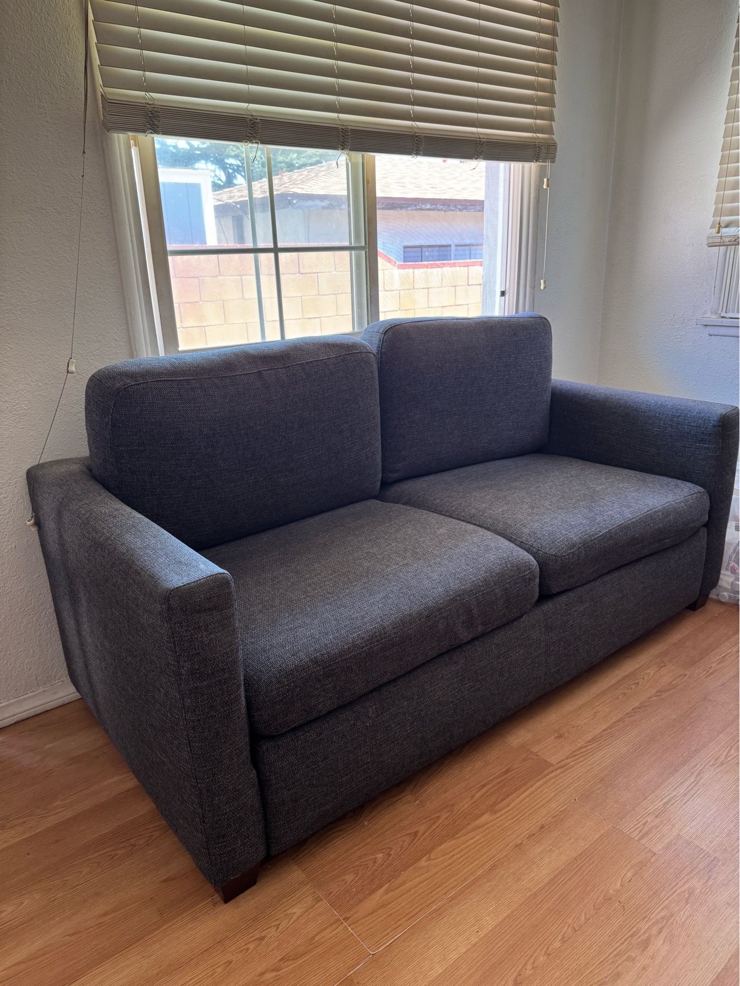 Blue couch bed sleeping