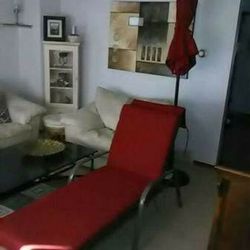 Lounger chair w/cushion and umbrella w/stand! Like New! 