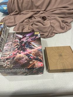 Bandai MG Justice Gundam w/ metal inner frame addon kit.