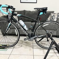 Specialized Dolce Road Bike & Cycle Ops Trainer