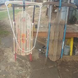 2 vintage wooden sleds