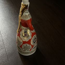 Russian porcelain bottle shaped like a Matryoshka doll