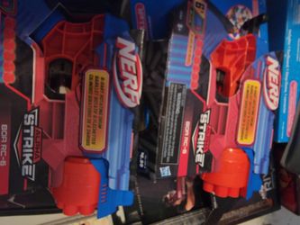 Two Nerf STRIKE guns