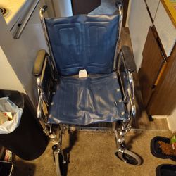 Blue Invacare Wheelcair