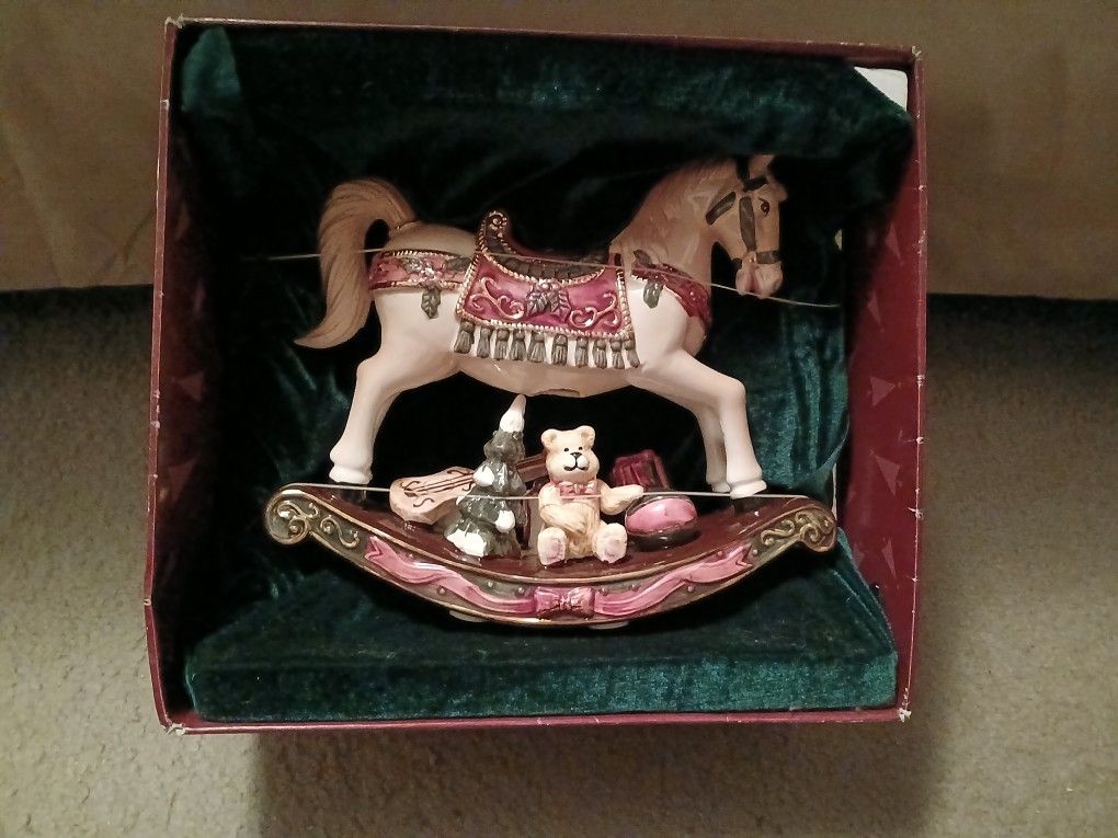 Ceramic Christmas Holiday Carousel Rocking Horse Figurine by Classic Traditions. 