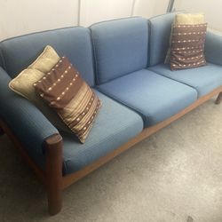 Blue fabric sofa with teakwood fram