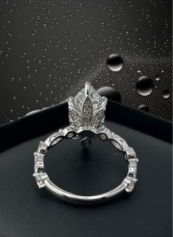 Flower style prong marquee diamond ring in white gold