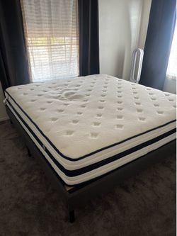 Like new King Mattress / Wood bed frame
