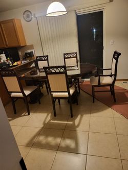 Dining Table With Protected Glass and 5 Chairs $500