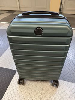 Delsey spinner carry on