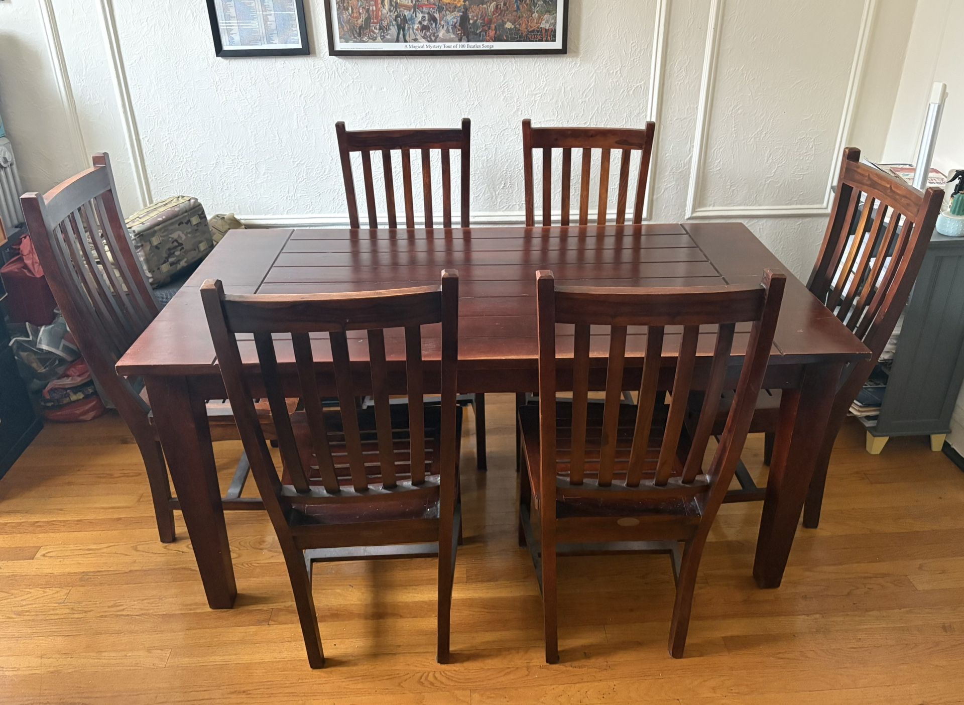 Wooden Table, with six chairs.