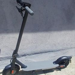Electric Scooter With Solid Tires. 56 Original Miles.