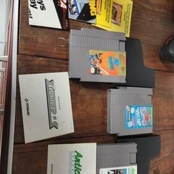 Various Nintendo games,manuals and materials. .
See pics