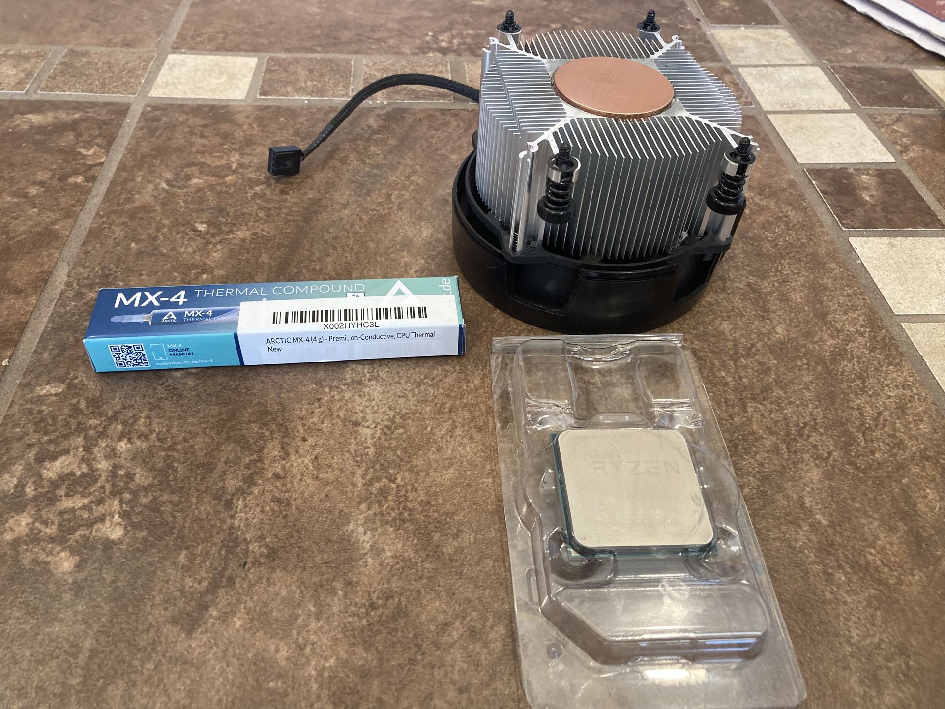 AMD Ryzen 5 1600, Wraith Cooler And Thermal Paste