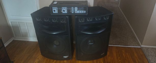 2 - Pyle 400 watt speakers & Rockville 2000 watt. 4 - channel Amp