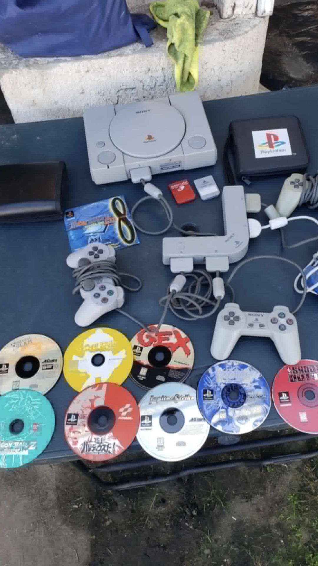 9 PS1 Games. With Playstation 1 Console all cables. 1 Station. 4 Controllers. 2 memory Cards. 1 Disc Newsealed. $400! Or best offer. Trade are welcome