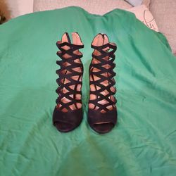 Alaia suede and black leather boots