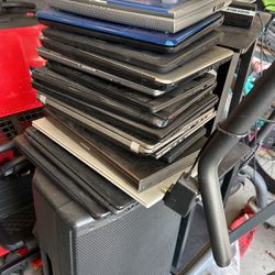 Stack Of Laptops. All Years And Makes