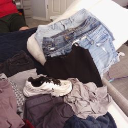 Shoes And Pile Of Good Clothes