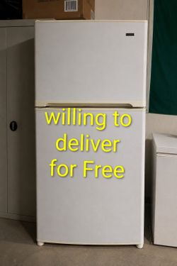 Kenmore top-freezer refrigerator in good working condition. Clean and ready